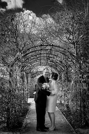 Surrey wedding photographer- leatherhead register office-groom and bride in archway