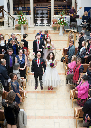 Surrey wedding photographer- St Paul's Church Addlestone- Braid and Groom going down the aisle
