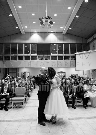 Surrey wedding photographer- St Paul's Church Addlestone- first kiss as married couple