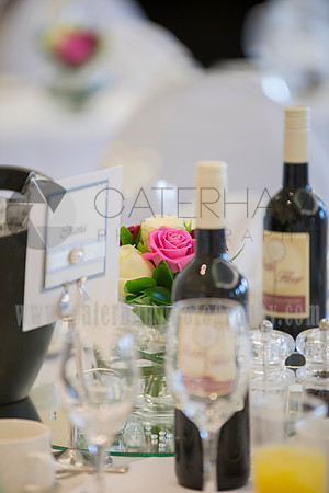 Romantice wedding -Surrey wedding photographer/ The wine bottles at the table/ Wedding decorations
