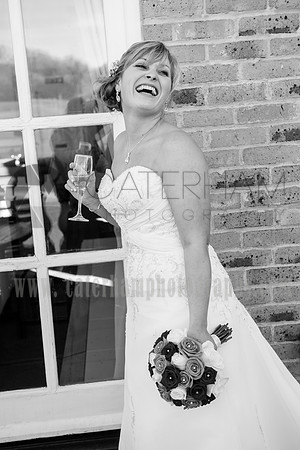Romantice wedding -Surrey wedding photographer/ The bride laughing - Black and white photogrpahy
