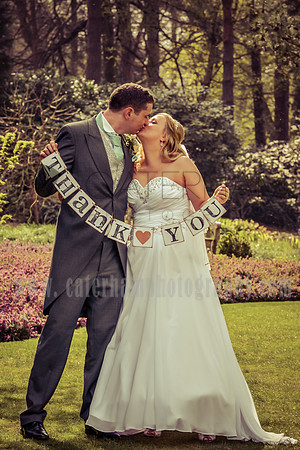 Surrey wedding photographer /vintage wedding / The bride and groom kiss "thank you"