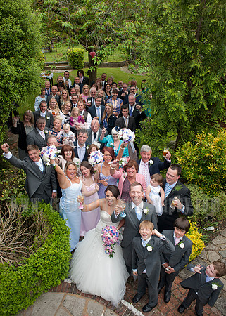 Surrey wedding photographer /Legacy Thatchers Hotel Wedding the long group shot (10)