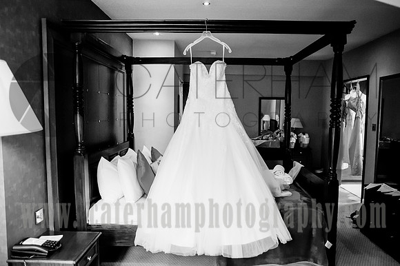 Surrey wedding photographer /Legacy Thatchers Hotel Wedding the hanging dress 21