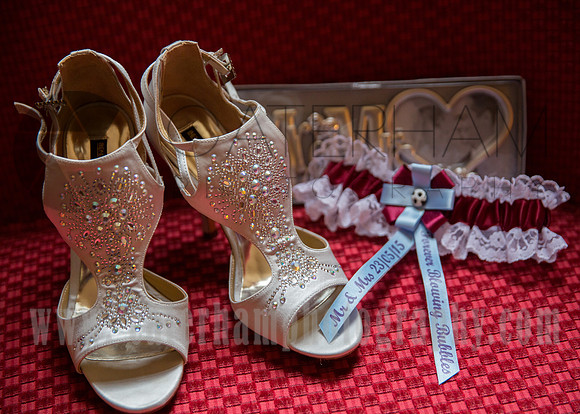 Surrey wedding photographer /Legacy Thatchers Hotel Weddings the shoes and garter 22