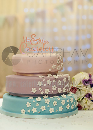 Surrey wedding photographer /Legacy Thatchers Hotel Wedding the cake displayed 37