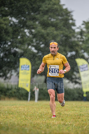 surry photographer- The Caterham Rotary Half Marathon & 10K- short man running