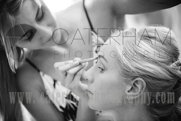 Surrey wedding photographer- Bridal Preparation- bridesmaids having makeup done