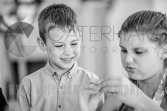 Surrey wedding photographer / Tyrrells Wood Golf Club Wedding / Kids playing at the wedding party / Black and white wedding photography