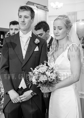 Surrey wedding photographer / Tyrrells Wood Golf Club Wedding /  The groom and the bride in the reception