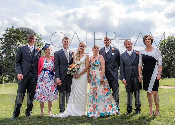 Surrey wedding photography / Tyrrells Wood Golf Club Wedding / Groom and bride with their families / Wedding family photos