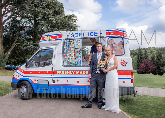Surrey Wedding Photography / Tyrrells Wood Golf Club Wedding / The wedding couple with the ice-cream van
