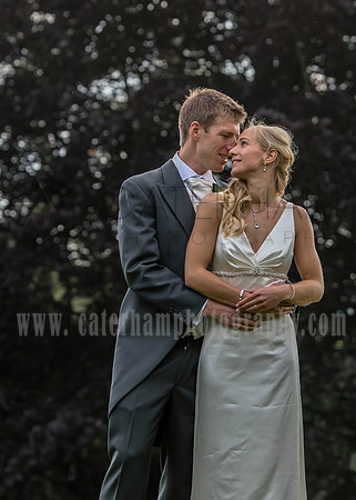Surrey wedding photographer / Tyrrells Wood Golf Club Wedding / The bride and groom hugging and looking into each other eyes