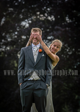 Surrey wedding photographer / Tyrrells Wood Golf Club Wedding / The bride hiding grooms eyes