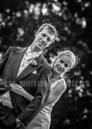 Surrey wedding photographer / Tyrrells Wood Golf Club Wedding  The bride grabbing the groom / Black and white wedding photography