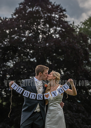 Surrey wedding photographer / Tyrrells Wood Golf Club Wedding / "thank you" Wedding couple kiss