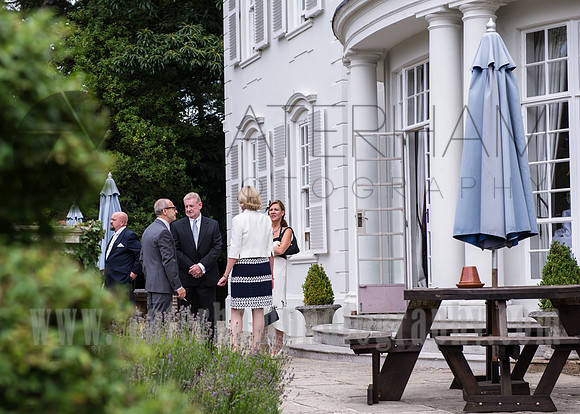 surrey wedding photographer- Gorse Hill Wedding Woking- wedding guests outside