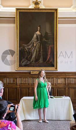 surrey wedding photographer- kingston county hall- bridesmaid singing