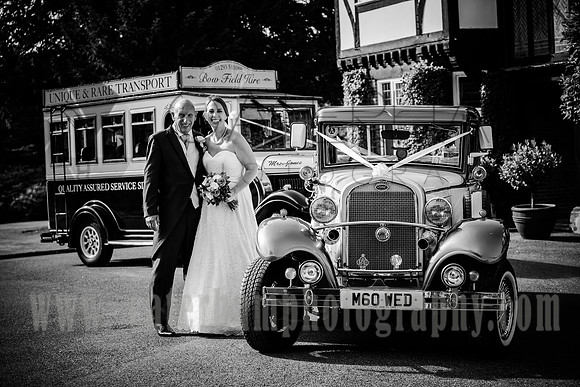 East Grinstead Wedding Photographer / yew lodge weddings /  The bride and groom next to the wedding car
