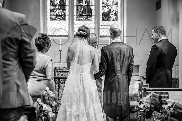 surrey wedding photographer- chaldon church- bride and groom