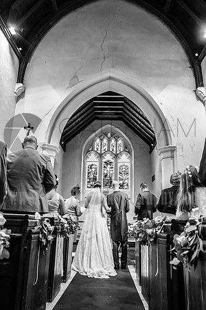 surrey wedding photographer- chaldon church- bride and groom  inside church