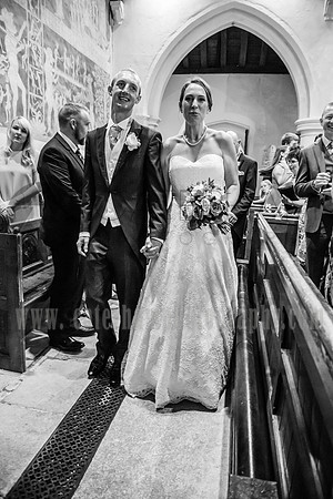 surrey wedding photographer- chaldon church- bride and groom black and white