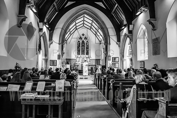 Kent wedding photographer / St Mary's Church Ide Hill Wedding / Guests in the church before the ceremony / Black and white wedding photos