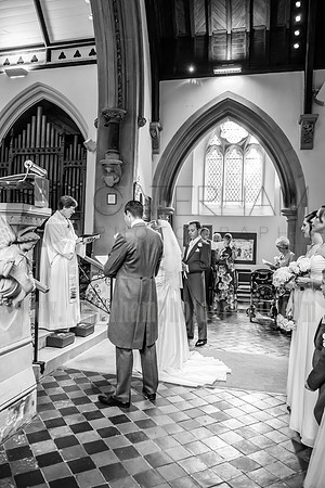 Kent wedding photography / St Mary's Church Ide Hill Wedding / The wedding couple t the altar / Black and white wedding photos
