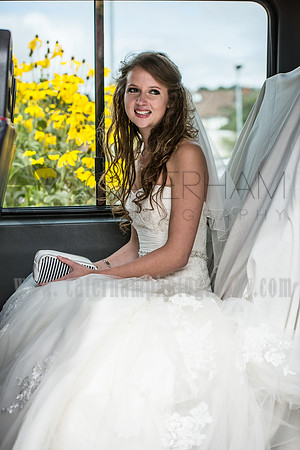 Surrey wedding photographer / reigate baptist church (30) / The bride in the wedding car smiling