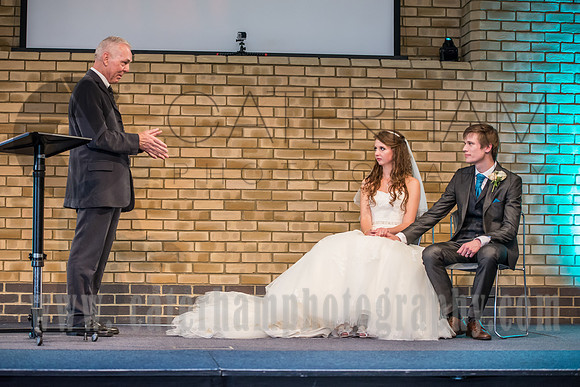 Surrey wedding photography / reigate baptist church (11) /  / Speech to the young couple during the ceremony