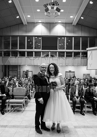 Surrey wedding photographer / Wedding at St Paul’s Church in Addlestone / The groom and bride standing at the front of the church