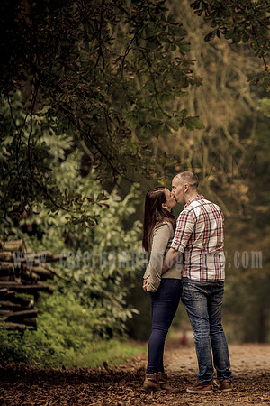 Surrey wedding Photographer Pre wedding shoot (3) / The couple kissing under the tree