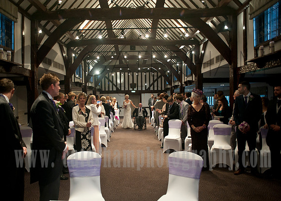 Groom's first look wedding photo at Mercure Box Hill Burford Bridge Hotel