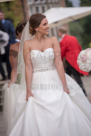 Surrey wedding photographer / selsdon park hotel wedding Bride hitching her dress 18