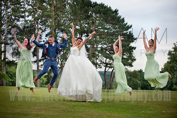 Surrey wedding photographer / selsdon park hotel wedding another leap for the bridal party 23