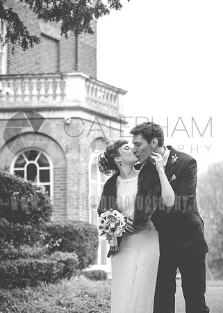 surrey wedding photographer- merton register office morden park house-  bride and groom kissing