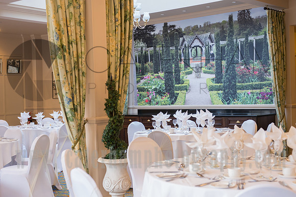 Surrey wedding photographers / reigate manor hotel wedding / The wedding receptions / White table decorations / Beautiful wall images