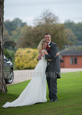 surrey wedding photographer- Crowhurst Park Wedding East Sussex- bride and groom hugging