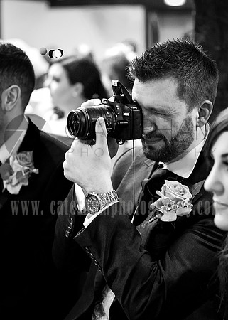 Wedding guests are taking photos at the wedding Mercure Box Hill Burford Bridge Hotel