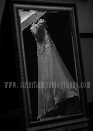 Surrey Wedding Photographer- weald of kent golf club- beautiful mirror image of wedding dress