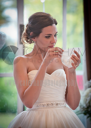 Surrey wedding photographer / selsdon park hotel wedding bide checking the details 24