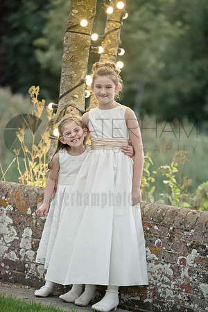 Surrey wedding photographer / The Red Barn Wedding reception (31) / Two little girls on the wedding / Wedding family photos