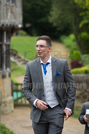 Surrey wedding photographer Godstone Church Wedding The groom arriving