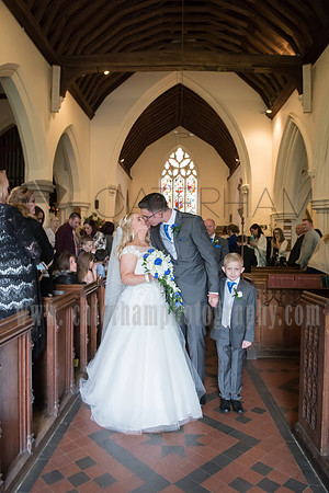 Surrey wedding photographer godstone church wedding The Bride and groom kiss