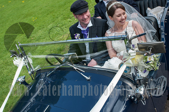 Surrey wedding photographer Hartsfield Manor  Wedding  couple in the car