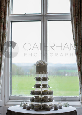 Surrey Wedding Photographer- Chiddingstone Castle Weddings- Cakes in the window