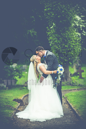 Surrey wedding photographer godstone church wedding Wedding kiss in the gardens