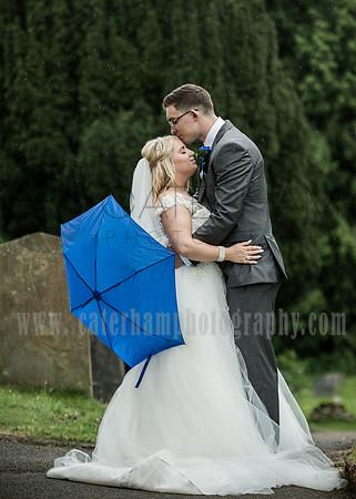 Surrey wedding photographer godstone church wedding Groom kissing Braids forehead