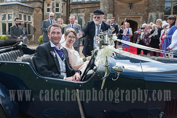 Surrey wedding photographer Hartsfield Manor  Wedding  couple in the car