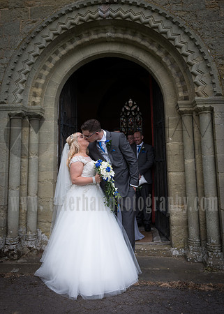 Surrey wedding photographer godstone church wedding New married couple kissing